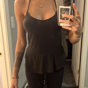 black tank top with ruffled bottom
